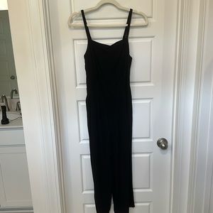Women’s black jumpsuit.